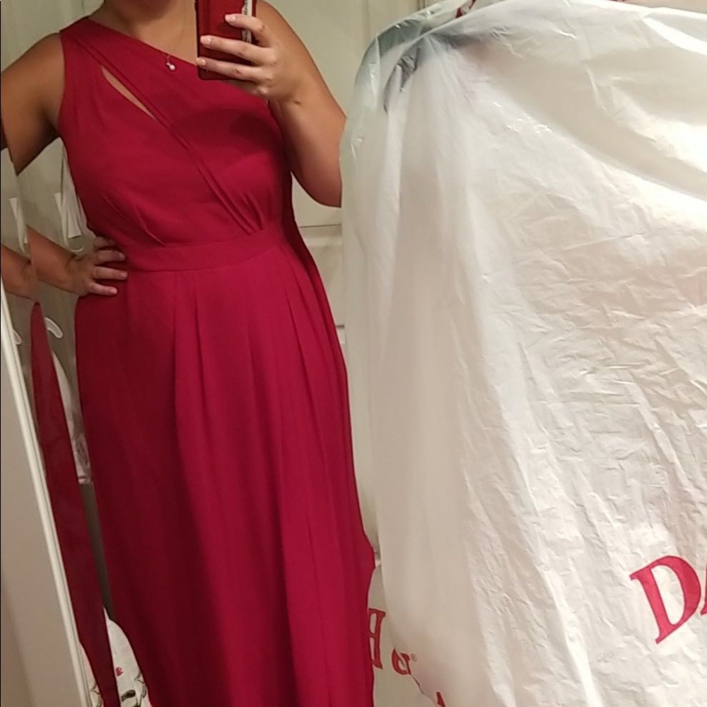 Red David’s bridal long dress with leg slit.